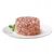 Порция влажного корма на белой тарелке, розовый кусок мяса с сочной консистенцией и зеленым листом травы в качестве украшения.