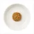 Portion of wet pet food with visible pieces of carrot and peas served on a white plate, showing texture and ingredients.