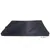 Coussin rectangulaire noir pour animaux, surface en tissu synthétique, poignée latérale visible, sans autres éléments distinctifs ou texte apparent.