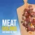 Texto en inglés: MEAT DREAMS ARE MADE OF THIS! Trozos de carne y verduras sobre una tabla de madera.