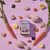 Naturediet Feel Good Puppy food with visible ingredients including chicken pieces, carrots, rice grains, hard-boiled eggs and seaweed arranged around the product packaging.