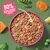 Bowl of food with visible meat and vegetables, surrounded by fresh ingredients. Text states: 90% freshly prepared meat ingredients and veg.