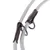 Close-up of a grey rope lead with brown leather accents and black metal rings.
