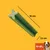 Snack verde em forma de cruz, comprimento 14 cm, largura 1,5 cm. Indicação para cães de 10–25 kg visível no canto inferior direito com imagem de cão.