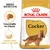 Royal Canin Adult Cocker, crocchetta su misura, salute della pelle e del pelo. Immagine di confezione con cane cocker spaniel e dettagli sulle caratteristiche visibili.