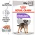 Pachet Royal Canin Sterilised All Sizes, 12 x 85g pate pentru câini. Text vizibil: Menține greutatea ideală, Care Nutrition. Imagine cu un câine și felii de pate.