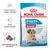 Royal Canin Starter Mother & Babydog Medium 1–2 months, podpora zdraví matky a štěněte, silný imunitní systém, rehydratovatelné granule, balení s obrázkem psů.