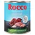 Консерва Rocco Junior, 800 г. Надписи: Supports healthy growth, Poultry with venison & rice, Geflügel mit Wild & Reis. Изображены мясо, рис, значок кальция.