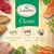 Lukullus Classic. 66% ingrediente animale selectate, fructe și legume, uleiuri și ierburi de înaltă calitate. Text vizibil pe fundal cu carne, pește, cartofi, morcovi, broccoli, mazăre.