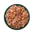 Bowl filled with chunky wet food containing visible pieces of meat, green peas and orange vegetable chunks.