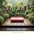 Red tray of litter surrounded by plants with text stating safe, natural and non-toxic. Additional text: all profits to the planet.
