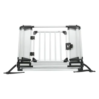 Transportbox aus Aluminium mit Gittertür und Sicherheitsverschlüssen, geeignet für den sicheren Transport von Haustieren im Auto.