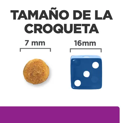 Tamaño de la croqueta: 7 mm de diámetro, comparado con un dado azul de 16 mm.