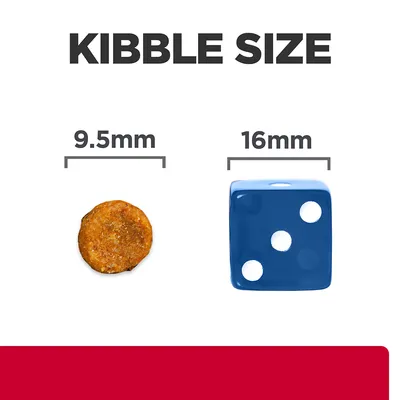 Kibble size comparison showing a 9.5mm kibble next to a 16mm dice for scale.