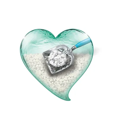 Metal scoop with blue handle, filled with white cat litter granules in a heart-shaped container.