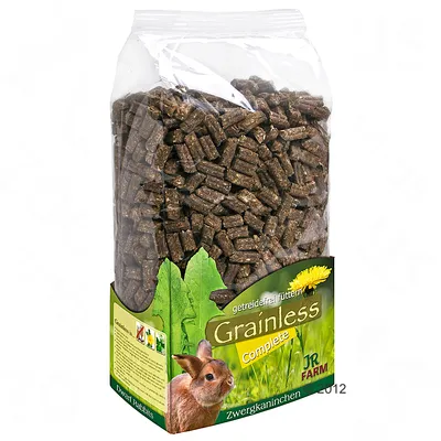 Bolsa de pellets con la etiqueta: getreidefrei füttern Grainless Complete JR Farm Zwergkaninchen Dwarf Rabbits. Imagen de un conejo y hojas verdes en el envase.