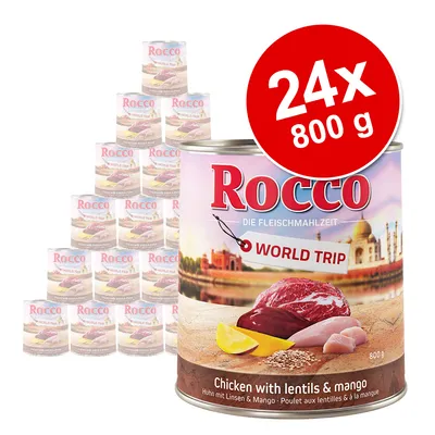 Pack de 24 latas de 800 g Rocco World Trip, visible texto: Chicken with lentils & mango. Imagen del producto y etiqueta promocional en la lata.