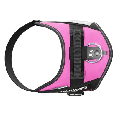 Pettorina per cani Julius-K9 IDC Power in tessuto rosa e nero, con anello metallico e maniglia superiore visibili.