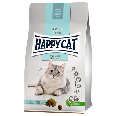 Happy Cat Sensitive 1+ years, Haut & Fell skin & coat. Tørfoder til kat med billede af grå kat og foderpiller. Tekst: Made in Germany, uden konserveringsstoffer, Natural Life Concept.