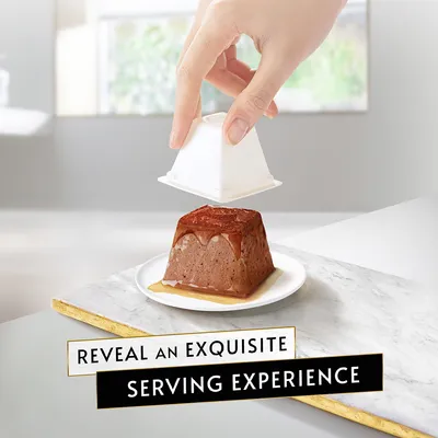 Hand lifting white plastic container from wet pet food on plate, text reads: Reveal an exquisite serving experience