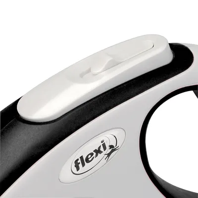 Flexi hundkoppel med ergonomiskt handtag och vit skjutreglage för längdjustering.