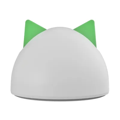 Dome-shaped product with two green triangular shapes on top, resembling ears. No visible branding or text.