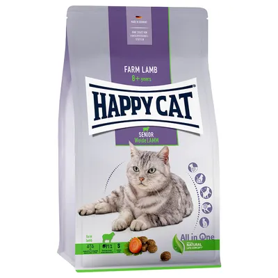 Pienso para gatos Happy Cat Senior Weide Lamm, visible texto: Farm Lamb 8+ years, All in One, Natural Life Concept, imagen de gato gris y croquetas. Fabricado en Alemania.