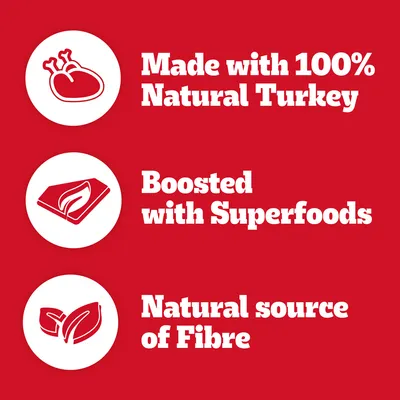 Text på engelska: Made with 100% Natural Turkey, Boosted with Superfoods, Natural source of Fibre.