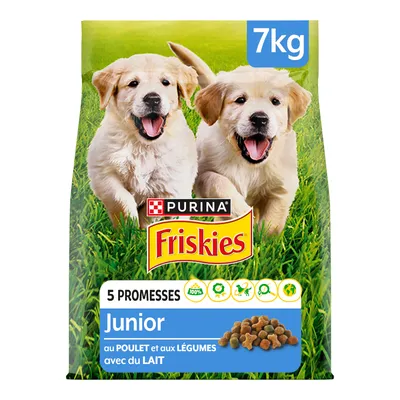 Confezione Purina Friskies Junior 7 kg, visibili due cuccioli, scritte: 5 promesse, Junior, au poulet et aux légumes avec du lait. Immagine crocchette e icone informative.