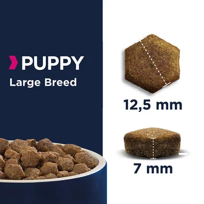 PUPPY Large Breed. Сухи гранули в купа и отделно показани размери на гранула: 12,5 мм диаметър и 7 мм височина.