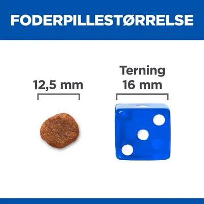 Foderpille ved siden af terning. Foderpillestørrelse: 12,5 mm. Terning: 16 mm. Sammenligning af størrelser for bedre overblik ved køb.