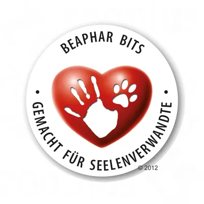 Beaphar Bits. Gjord för själsfränder. Rött hjärta med hand- och tassavtryck.