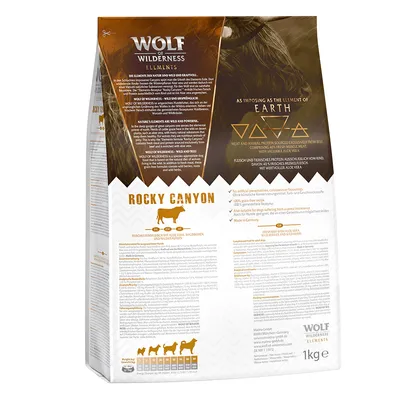 Wolf of Wilderness Elements Rocky Canyon, alimento per cani, 1 kg. Testo in inglese e tedesco, ingredienti principali carne di manzo e aloe vera. Tabella razioni consigliate visibile in basso.