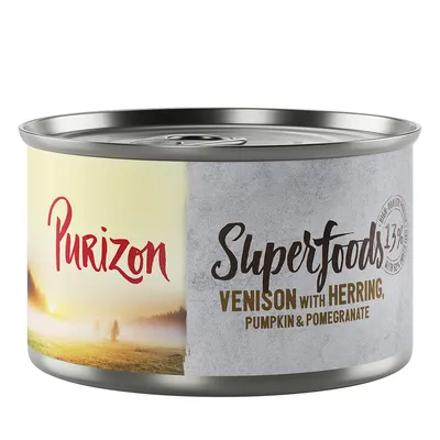 Boîte Purizon Superfoods, texte visible : Venison with Herring, Pumpkin & Pomegranate, 13 %. Marquage sur l’étiquette, paysage en arrière-plan.