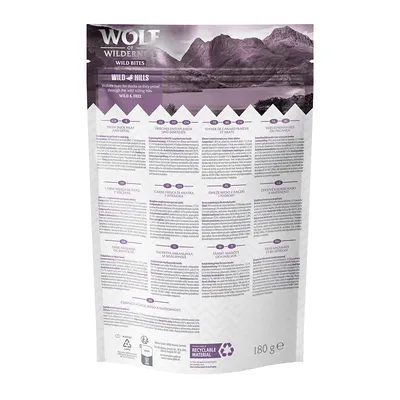 Wolf of Wilderness Wild Bites Wild Hills, viande de canard fraîche et abats, sachet 180 g, informations multilingues, matériau recyclable indiqué en bas du paquet.