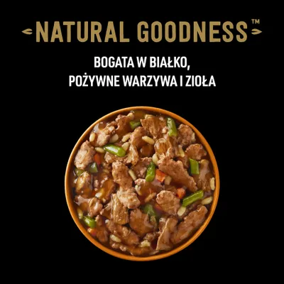 NATURAL GOODNESS. Bogata w białko, pożywne warzywa i zioła. Miseczka karmy z kawałkami mięsa, warzywami i sosem.