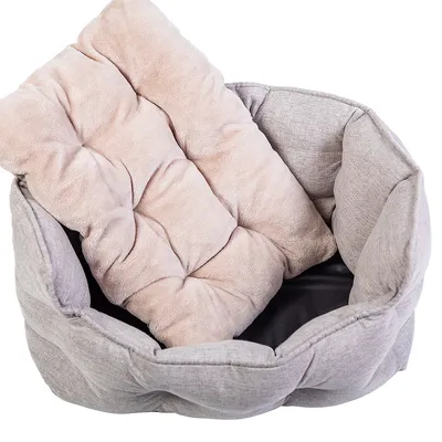 Grey pet bed with soft beige padding. Suitable for comfort and relaxation.