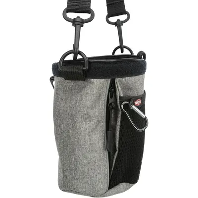 Grey bag with zip, mesh compartment and carabiner. Trixie brand visible on red label.