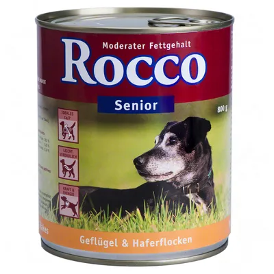 Rocco Senior hondenvoer, 800 g blik. Tekst: Moderater Fettgehalt, Geflügel & Haferflocken. Pictogrammen: Ideales Ca/P, Leicht verdaulich, Kraft & Energie. Hond afgebeeld op het etiket.