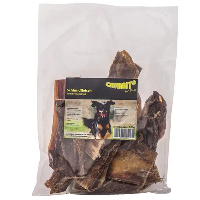 CANIBIT for Dogs, Schlundfleisch vom Freilandrind, pakiranje sušenih komada mesa za pse, neto masa 100 g. Na etiketi slika psa i tekst na njemačkom jeziku.