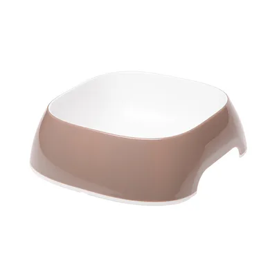 Barna és fehér műanyag etetőtál ergonomikus kialakítással.