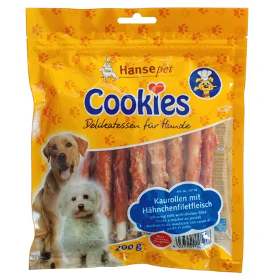 Hansepet Cookies Delikatessen für Hunde, bastoncillos de masticar con carne de pollo, envase de 200 g. Texto en alemán e inglés visible en el paquete.