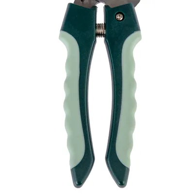 Green nail scissors with ergonomic handles and metal blades, suitable for precise cutting.