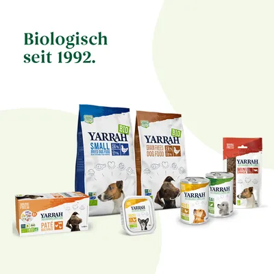 Produse Yarrah pentru câini și pisici: hrană uscată, conserve, pateuri și snack-uri. Text vizibil: Biologisch seit 1992. Ambalaje cu mențiuni bio și grain free.