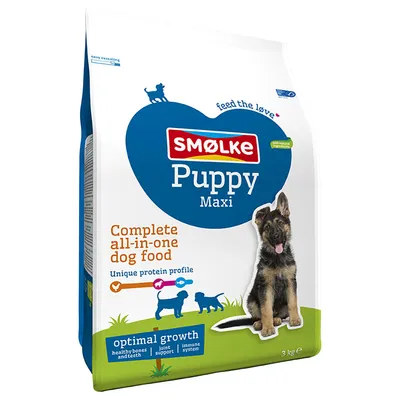 Smølke Puppy Maxi, complete all-in-one dog food for optimal growth: healthy bones and teeth, joint support, immune system. Packaging with image of a dog and 3 kg weight.