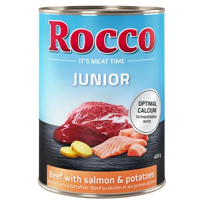 Rocco JUNIOR marhahússal, lazaccal és burgonyával, 400 g. Felirat: OPTIMAL CALCIUM TO PHOSPHORUS RATIO, IT'S MEAT TIME, Beef with salmon & potatoes.