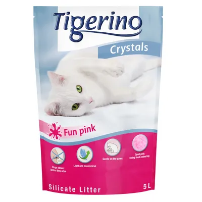 Tigerino Crystals Silicate Litter Fun pink 5L pack, shows features: stops odours, light and economical, gentle on the paws, dyed pink using food colouring. Image of white cat on packaging.
