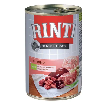 RINTI Kennerfleisch dåse med synlige stykker oksekød, tekst: MIT RIND, NEU noch mehr natürliche Fleischstücke. Billede af kød og indmad på etiketten.
