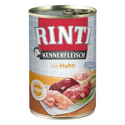 Scatola di alimento Rinti Kennerfleisch mit Huhn, con immagini di carne e pollo sul fronte. Testo visibile: 'Getreidefrei', 'Fleisch pur', 'Zusammensetzung verfeinert'.