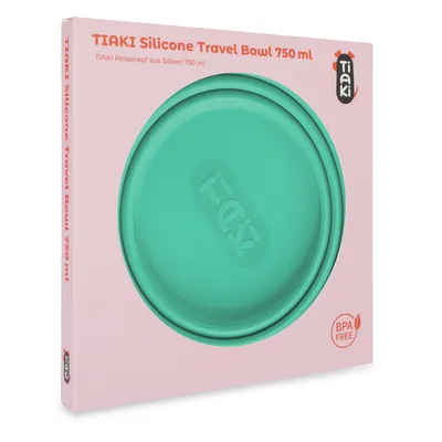 TIAKI travel bowl made of silicone, capacity 750 ml, BPA-free. Packaging shows green bowl and TIAKI logo.